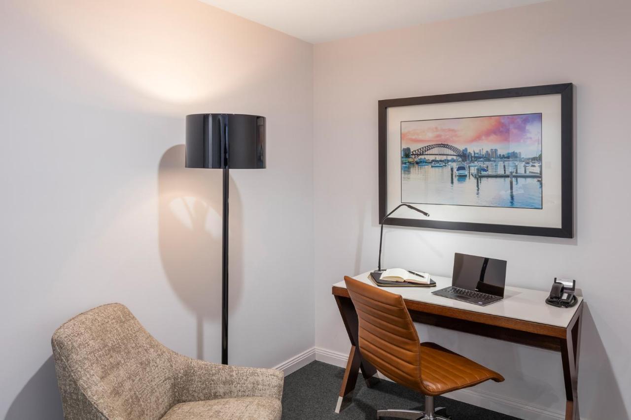 Meriton Suites North Sydney Exterior photo A work space in a hotel room