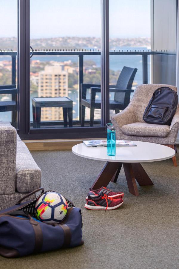 Meriton Suites North Sydney Exterior photo A typical room at the University of New South Wales