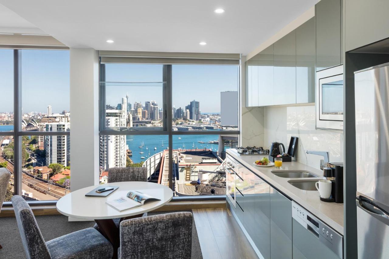 Meriton Suites North Sydney Exterior photo The kitchen of a typical apartment