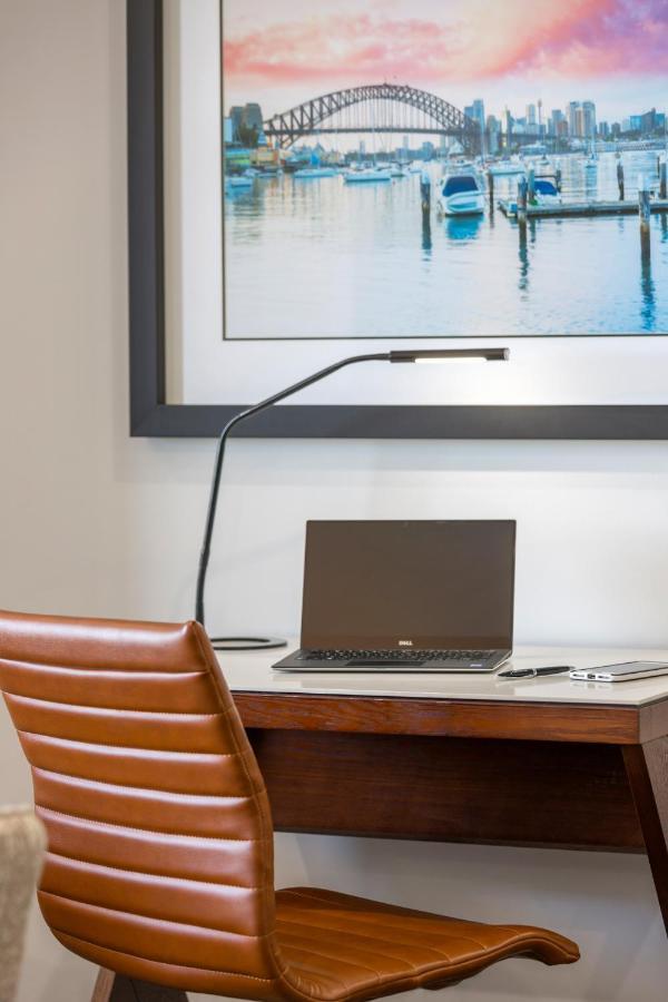 Meriton Suites North Sydney Exterior photo A modern LED desk lamp