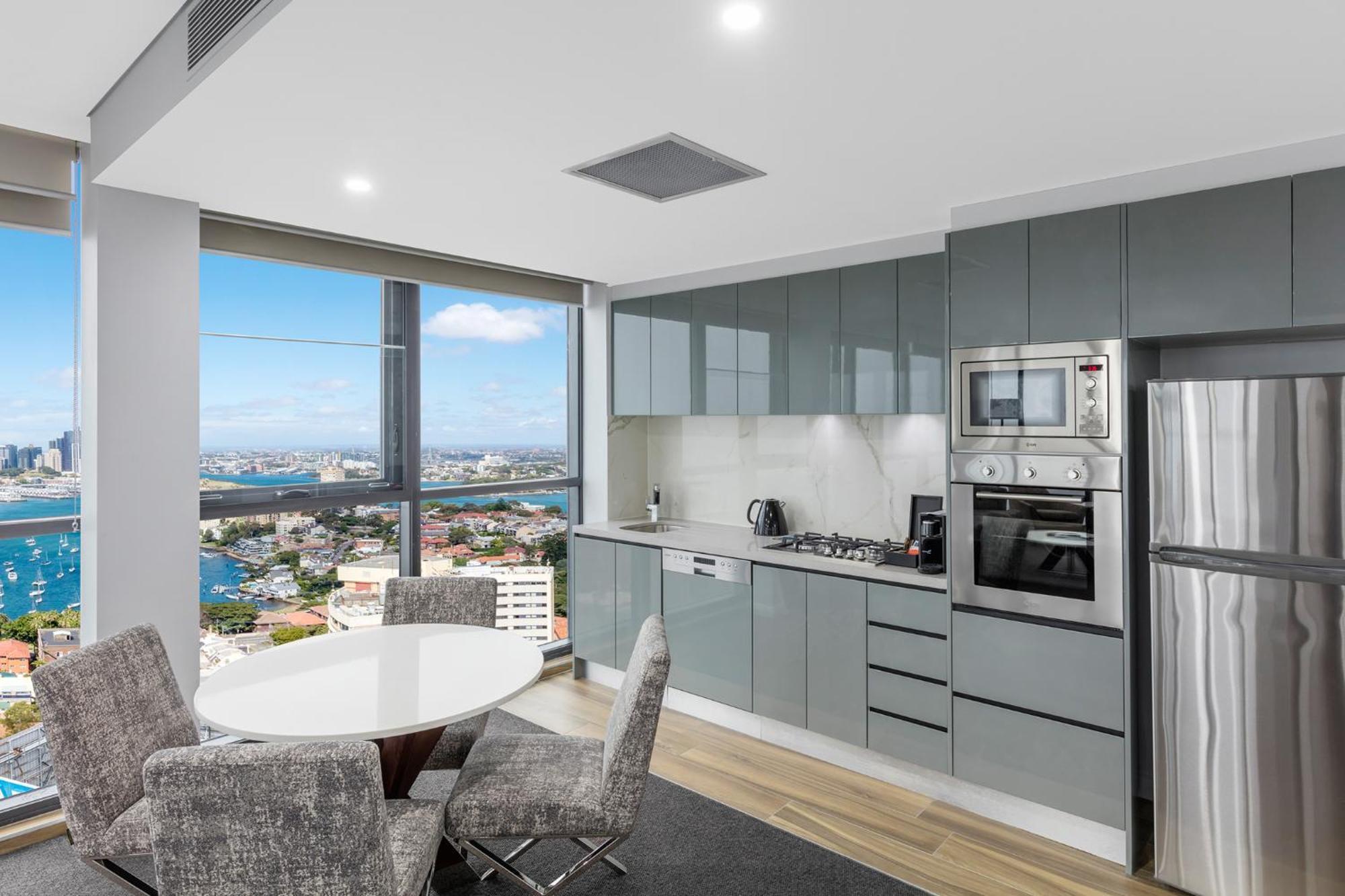Meriton Suites North Sydney Exterior photo The kitchen of a typical apartment